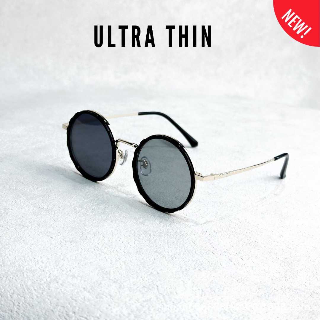 Ultra-thin round sunglasses with adjustable tint lenses and slim metal frame