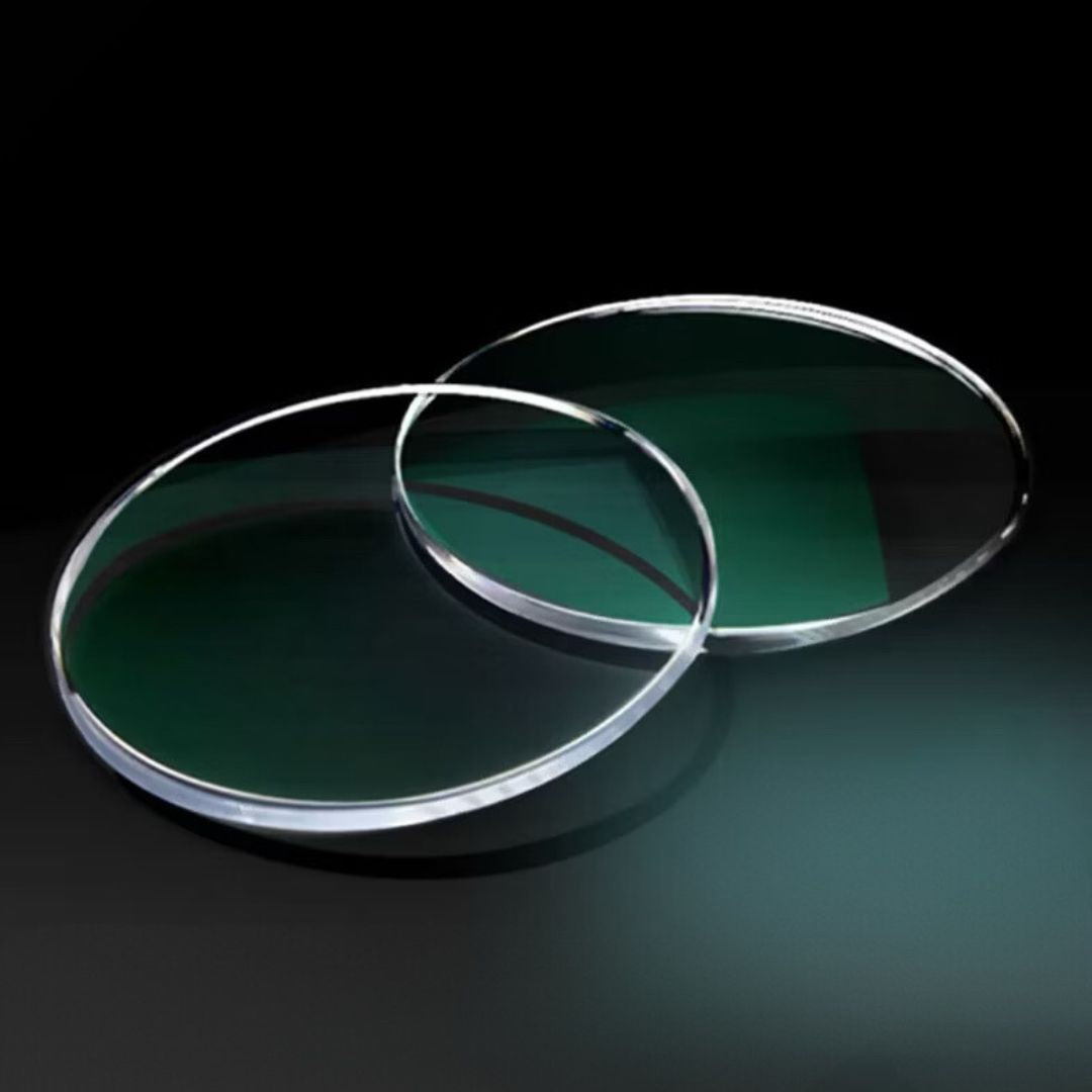 Pair of clear, circular optical lenses showcasing clarity and precision for magnetic glasses